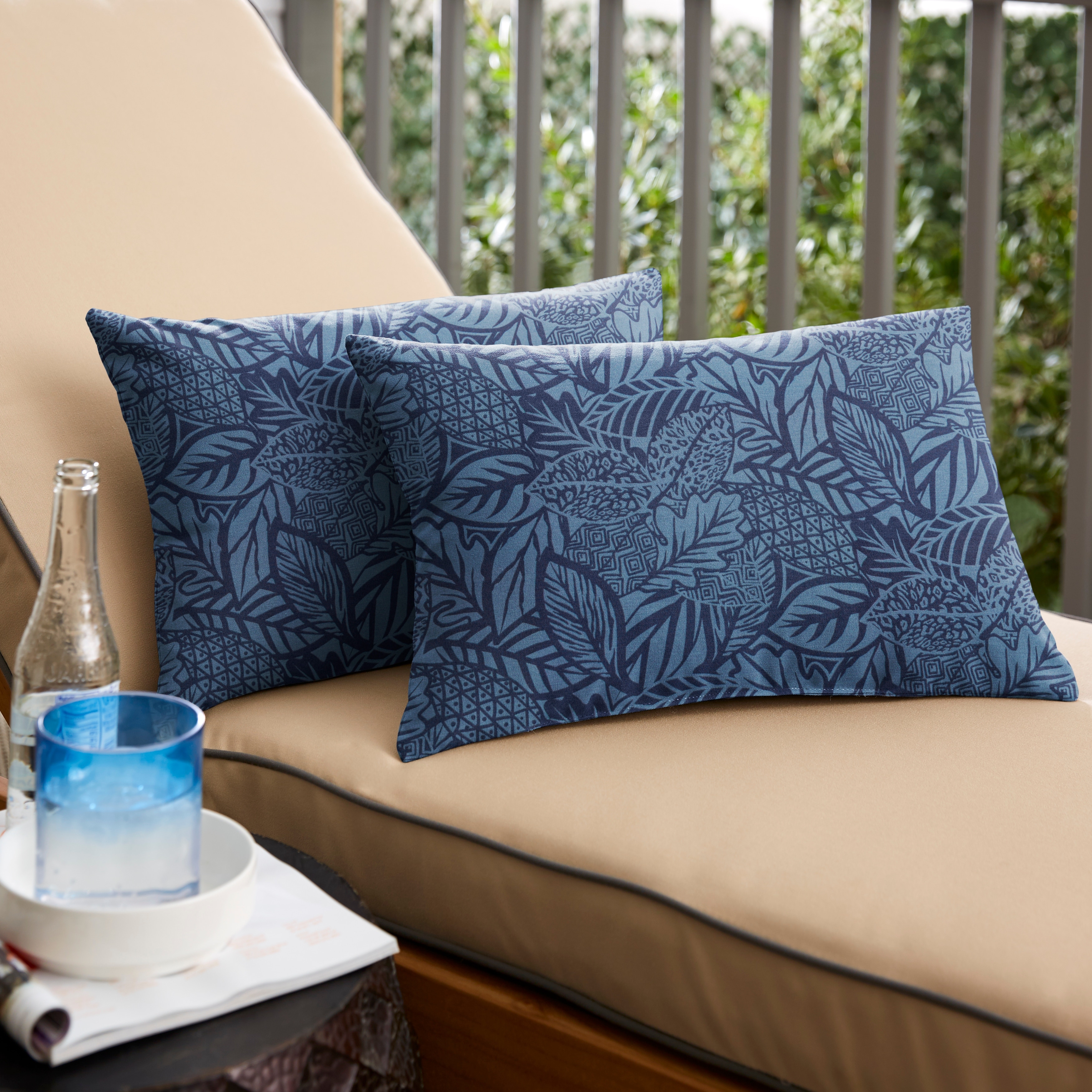 Blue and tan outdoor pillows top